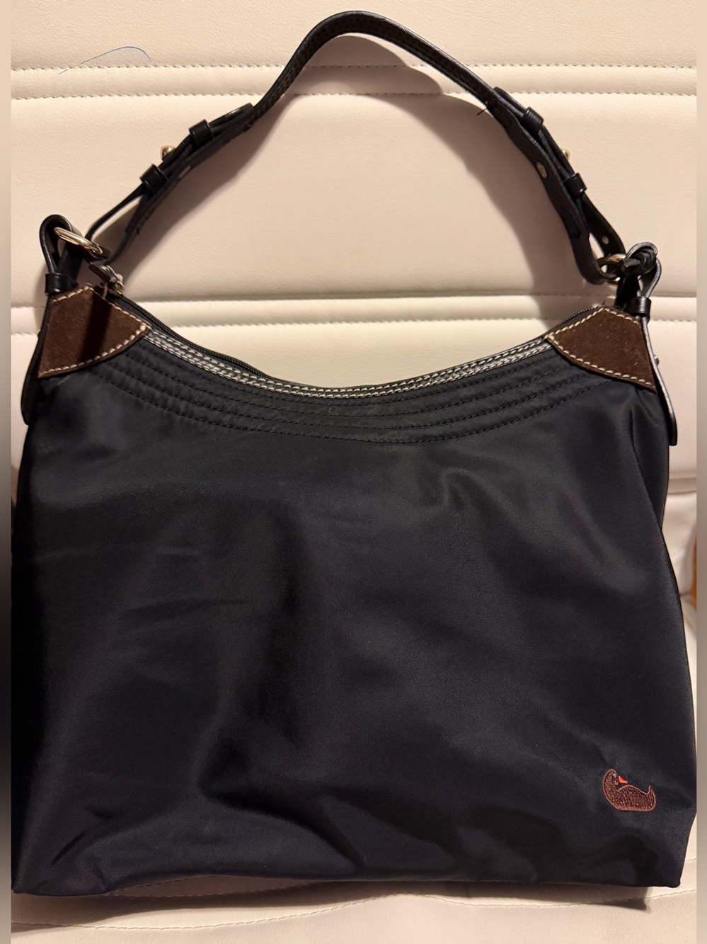 Dooney and Bourke “Erica” shoulder bag, nylon with leather trim.